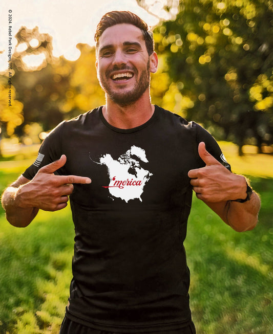 Man wearing a black t-shirt with a graphic design outdoors