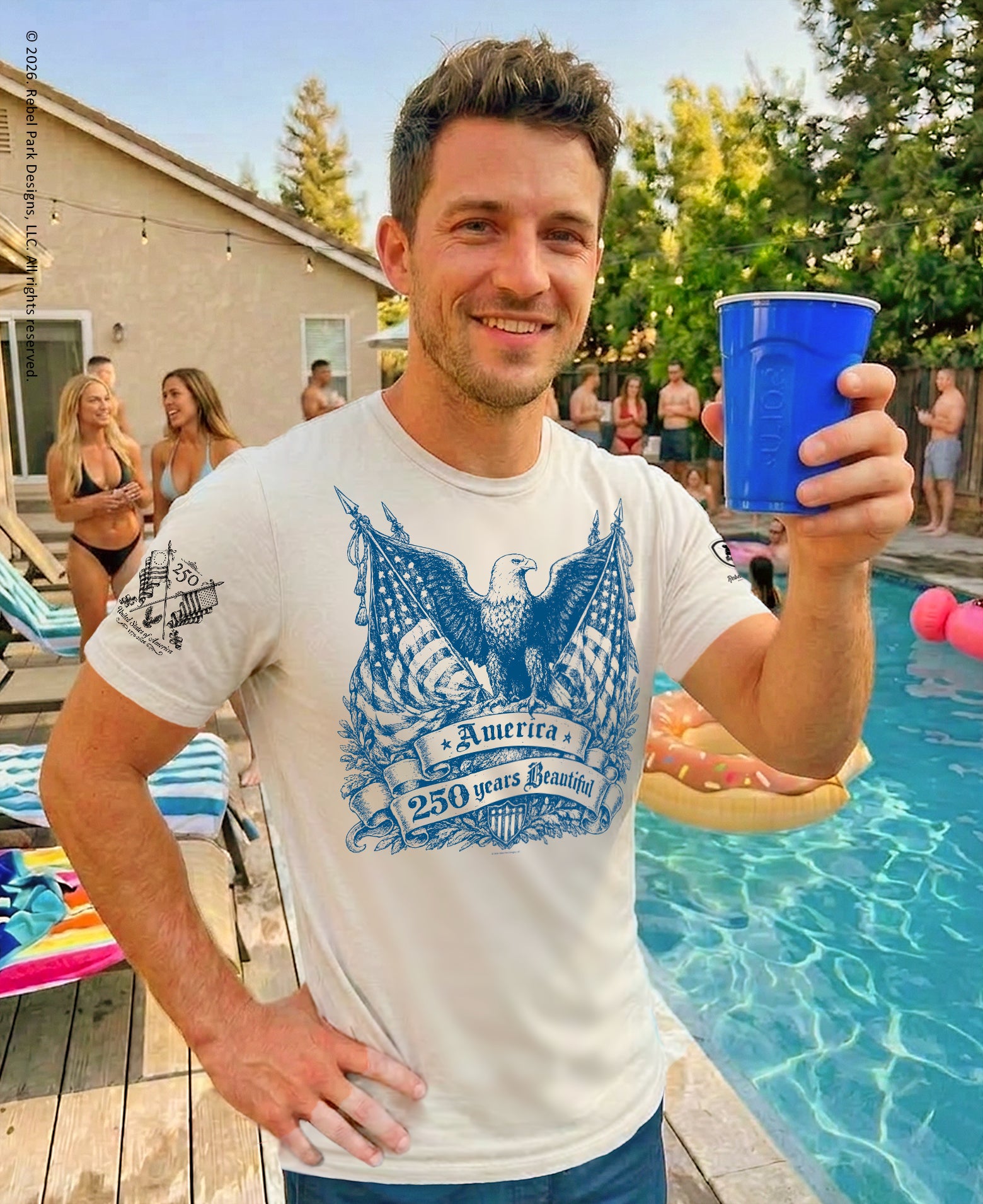 Man holding a blue cup by a pool with people in the background