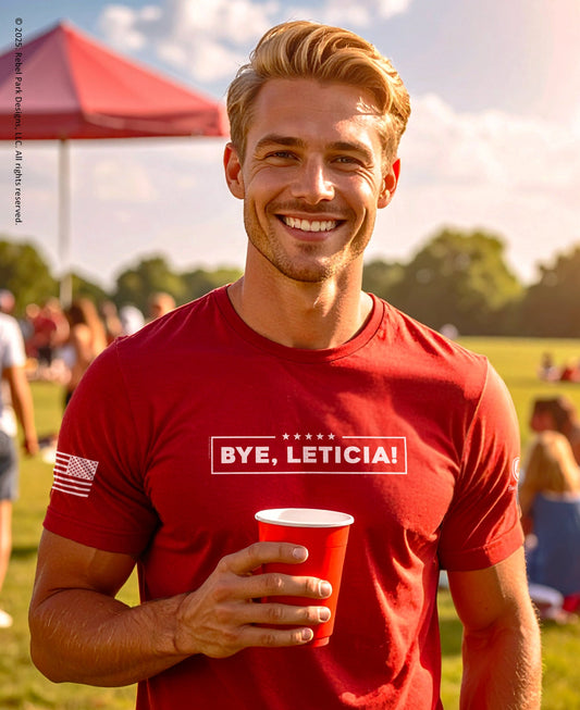 Man wearing a red t-shirt with 'BYE, LETICIA!' text, holding a red cup outdoors.