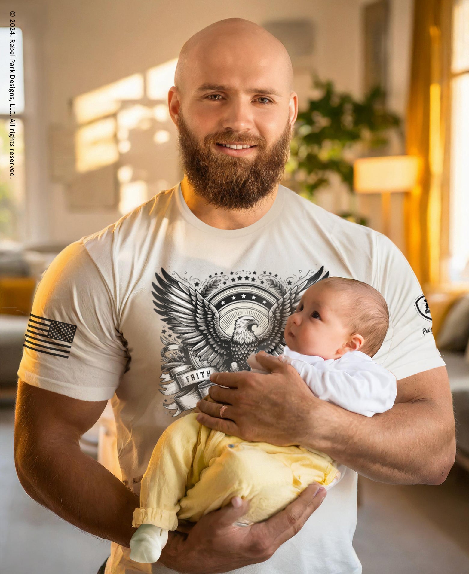 Man holding a baby indoors with a blurred background