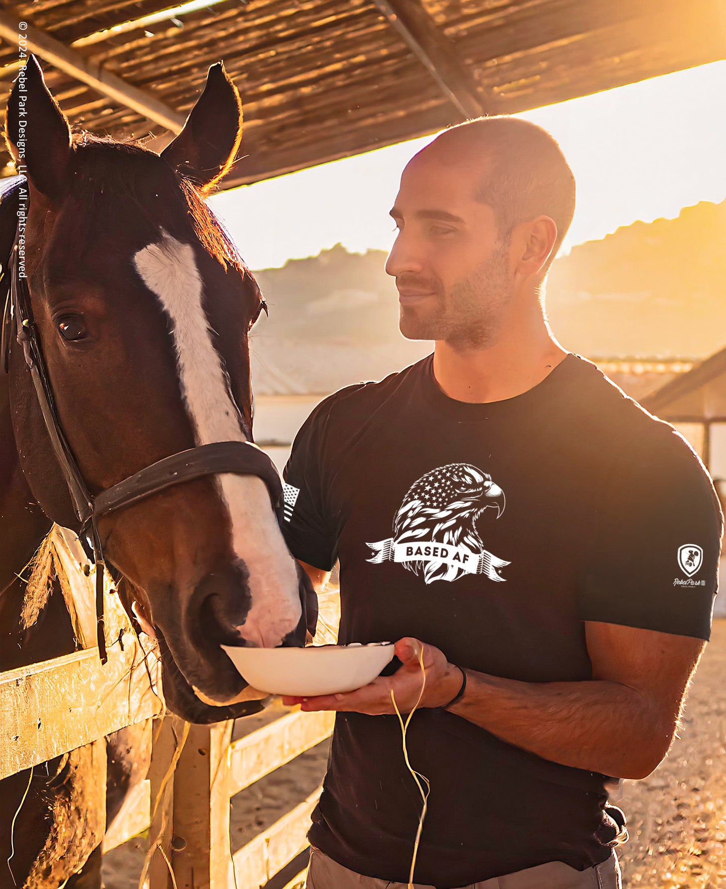 Man feeding a horse with a scenic background