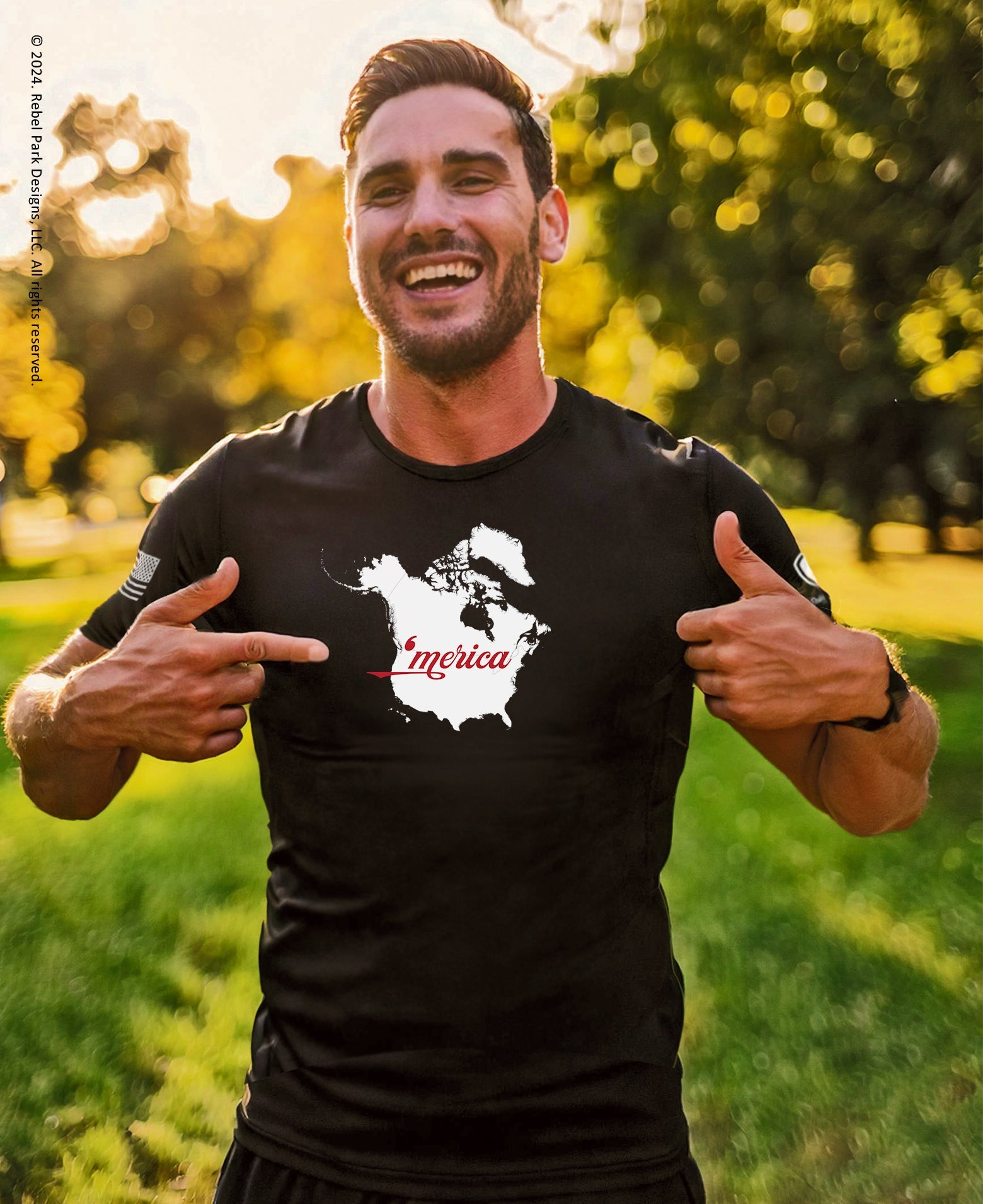 Man wearing a black t-shirt with a graphic design outdoors