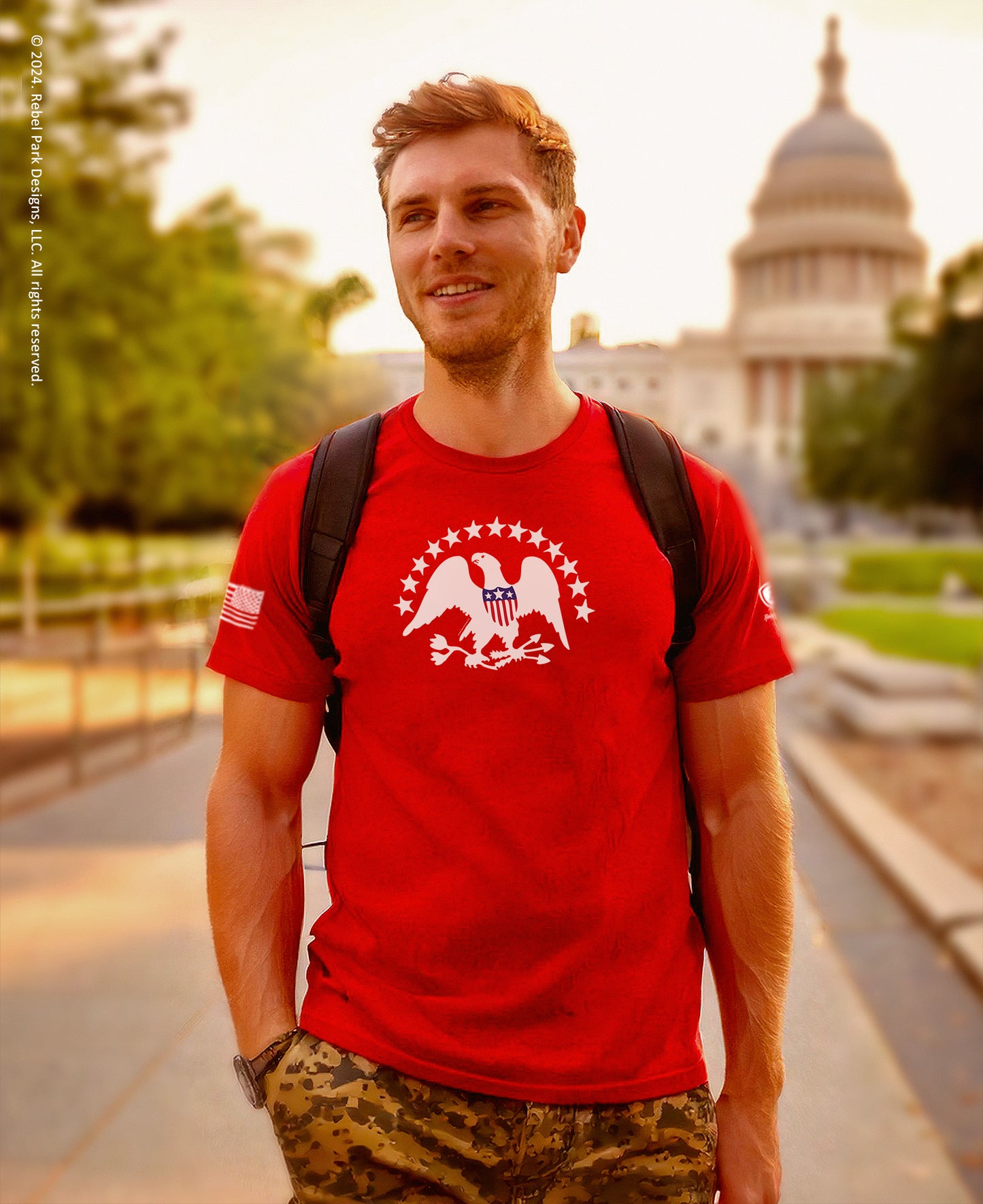 Young man wearing a red t-shirt with the indian flag symbol