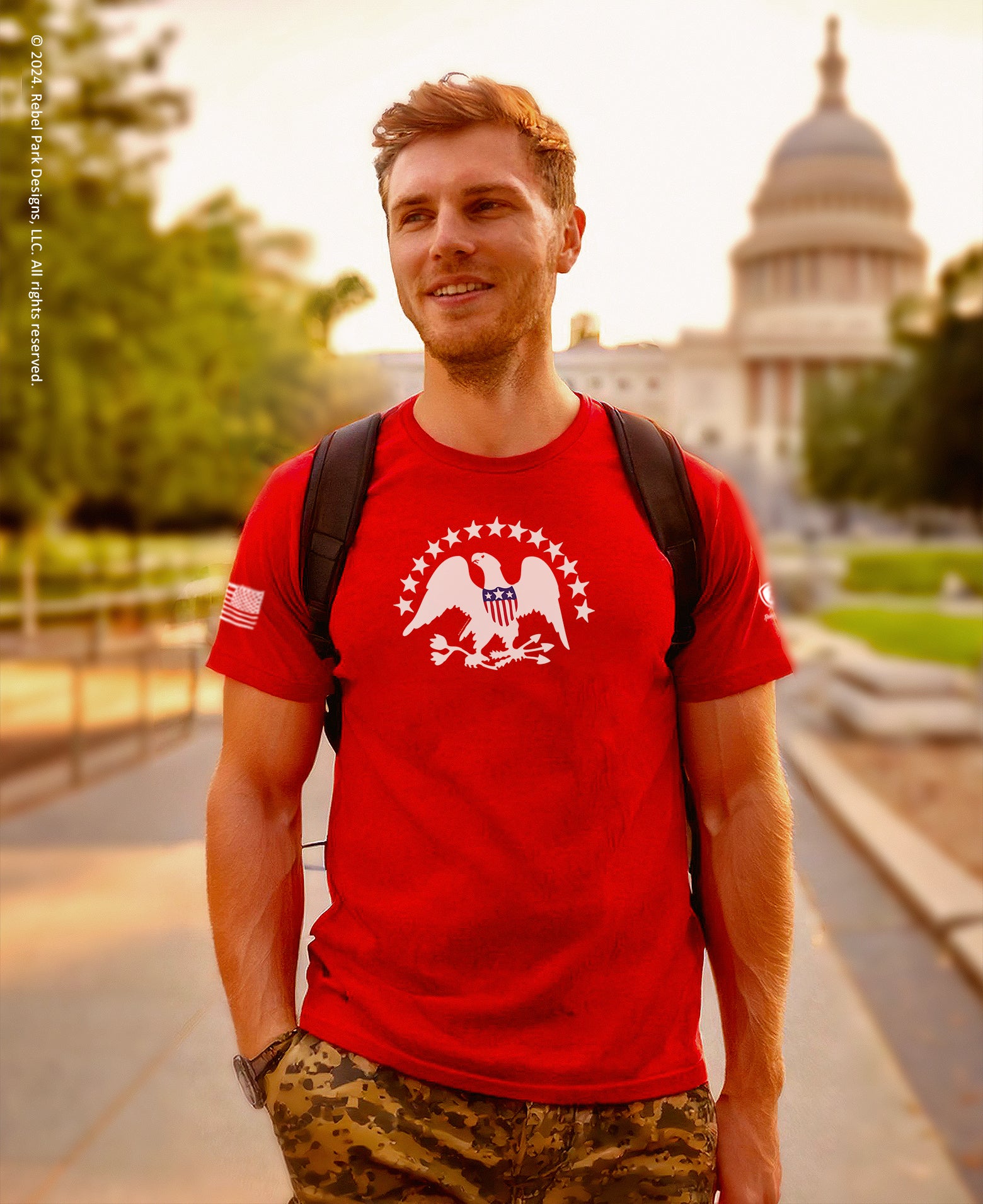 Young man wearing a red t-shirt with the indian flag symbol