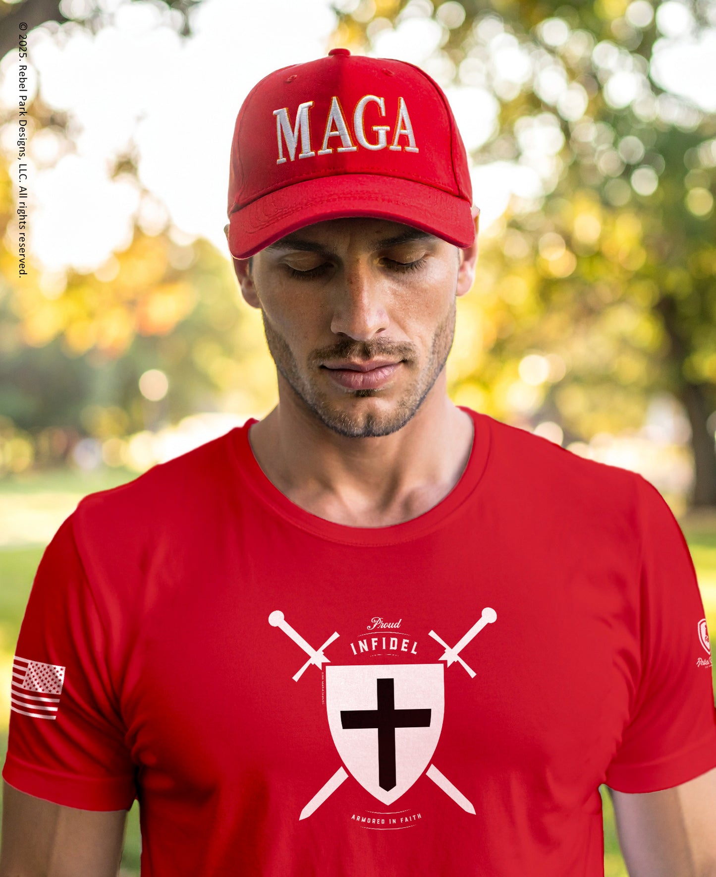 Man wearing a red 'MAGA' cap and red t-shirt with a logo outdoors.